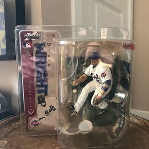 Bret Favre and David Wright McFarland figures, never opened.